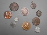 a lot of coins that are sitting on a table