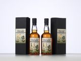 quelques bouteilles de whisky posées sur une table