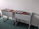 a table with a bunch of records on it in a room