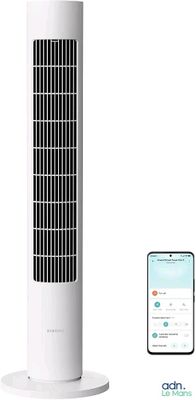 a white tower fan sitting next to a phone on top of a table