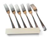 four forks and a napkin on a white table