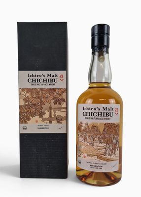 an image of a bottle of whisky next to a box