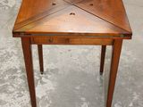 an image of a small wooden table with a drawer underneath it