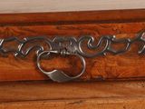 a close up of a drawer with a key on it
