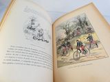 un livre ouvert sur lequel figure l'image d'un homme à vélo