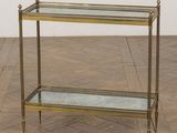 a glass shelf with a metal frame on top of it