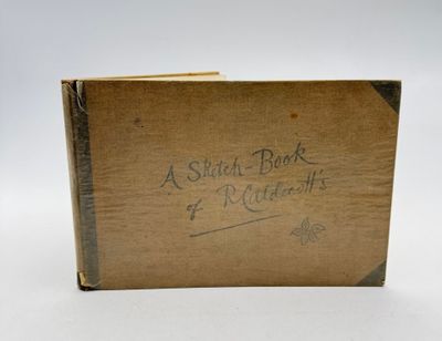 un vieux livre écrit posé sur une table