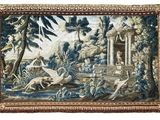 a close up of a tapestry hanging on a wall