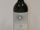 a bottle of wine that is sitting on a table