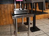 an image of a table and chairs in a restaurant