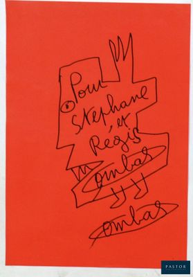 a red piece of paper with a drawing of a crown on it