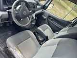 a picture of the interior of a car with a steering wheel