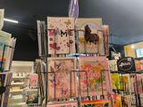 many cards on display in a store for sale