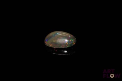 an oplite is shown in the dark with a black background