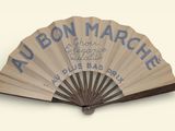 a fan that has a sign on it that says au bon marche