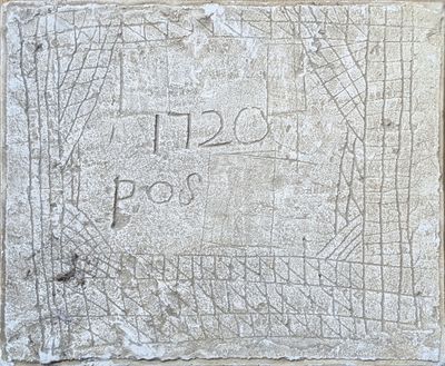 an image of a stone plaque with a map on it