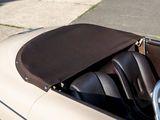 a close up of a car with a leather seat cover