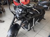 a motorcycle that is parked in a garage