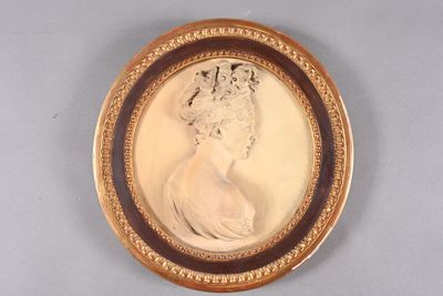an image of a picture of a woman in a white dress in a gold frame