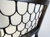 a black and white chair with a white seat
