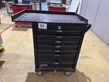 an image of a black tool cart in a warehouse