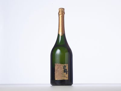 a bottle of wine that is sitting on a table