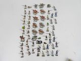 a lot of miniature figurines that are on the table