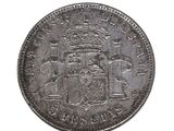 a close up of a silver coin with a crown on it