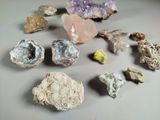 many different types of rocks and stones on the table