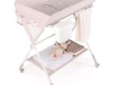 an image of a baby crib with a teddy bear in it