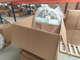 a large box full of items sitting on a pallet