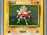 a close up of a pokemon card on a plastic card holder