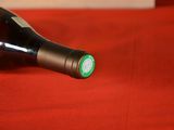 a bottle of wine that is sitting on a table