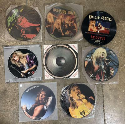 beaucoup de CD qui traînent par terre