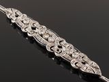 an art deco silver and diamond broochle