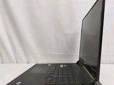 the laptop is sitting on a white surface with a white background