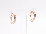 rose gold plated hoop earrings with black and white diamonds