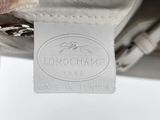 a close up of a bag with a label on it