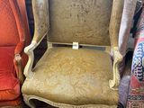 two chairs are sitting next to each other in a room