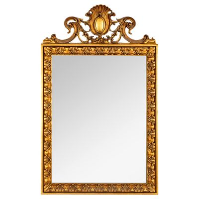 une image d'un miroir encadré d'or sur un fond blanc