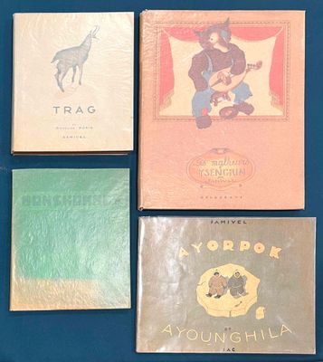 several books are lined up on a blue surface with a blue background