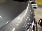 a close up of the hood of a car