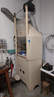 an image of a room with a furnace and a workbench