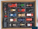 a box with a variety of toy cars in it