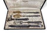 a silverware set in a box with a knife and fork