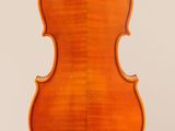 an old violin with a wooden back and bow on a white background