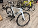 a bike that is sitting on a rack in a store