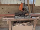 a machine that is sitting on a workbench in a garage