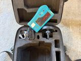 a case that has a camera in it on the floor