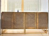 a wooden bench that is sitting in front of a window